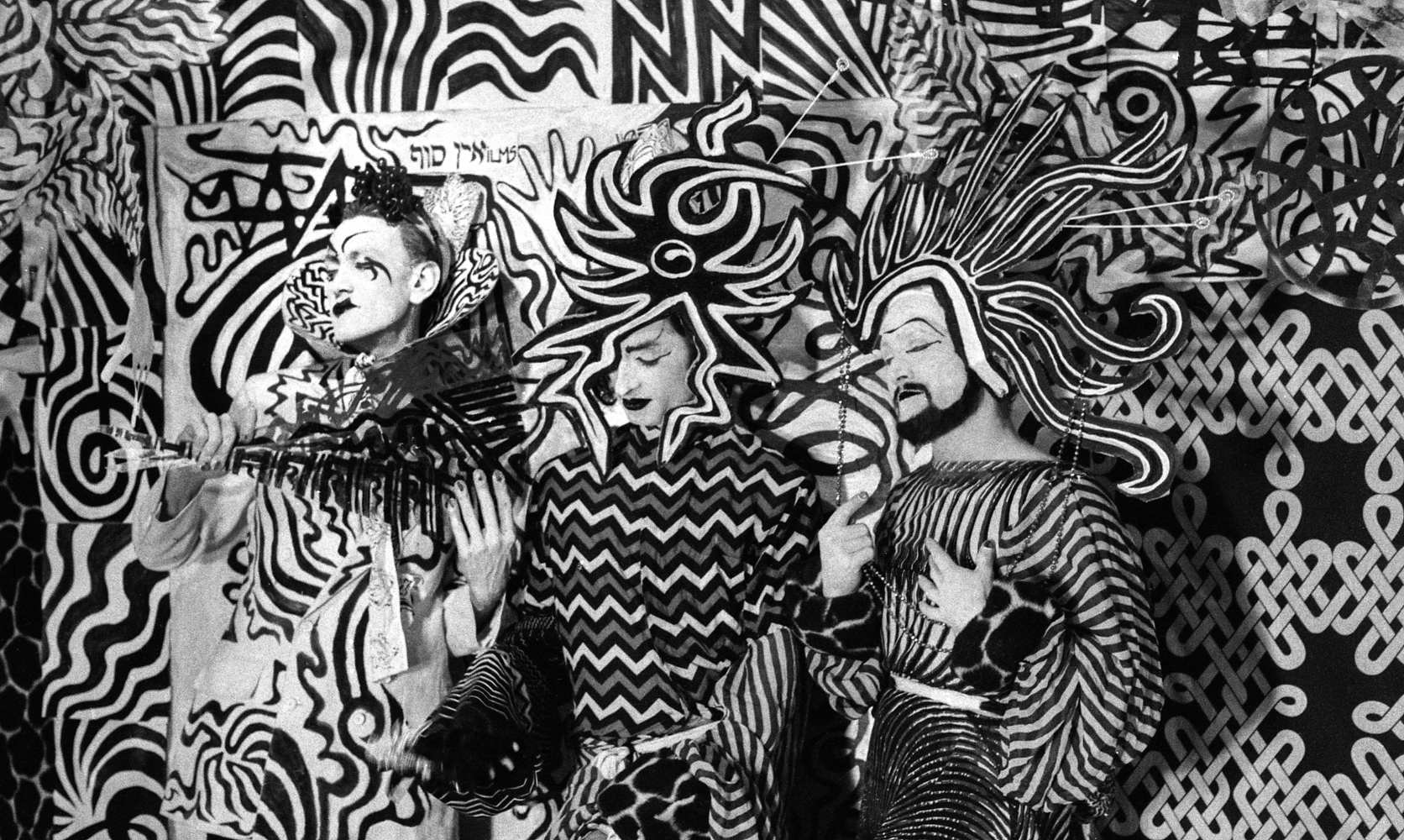 From the memorial�s sets-and-costumes collection: performers and painted scenery embody the transformation JET describes as �garbage and rags into regal attire.� Photograph by Joseph Johnston. More sets and costumes.